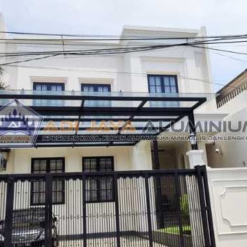 Kanopi kaca custom tempered 12mm untuk carport minimalis Bekasi